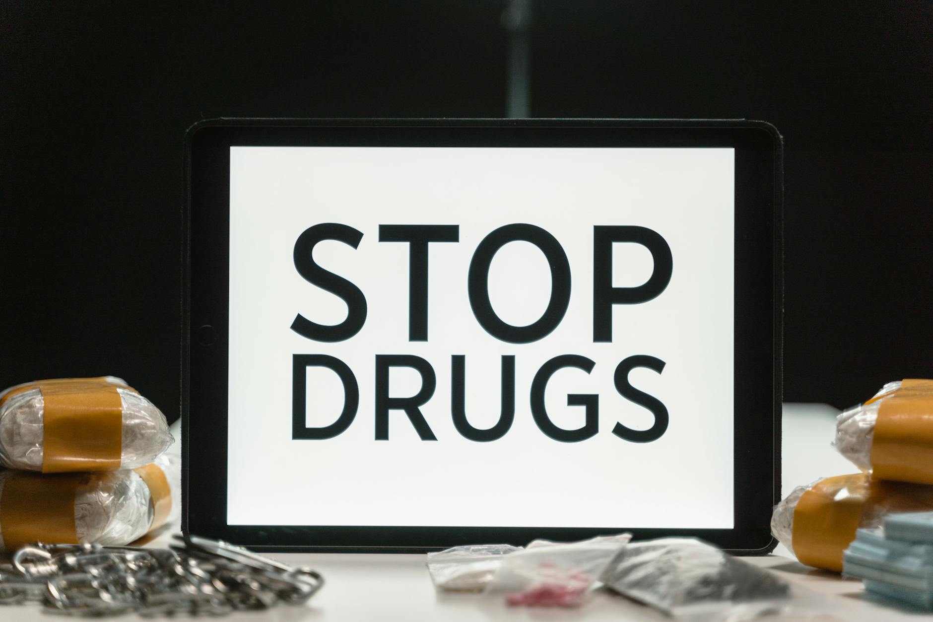 a tablet beside drugs